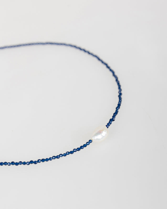 System Action Collar Azul Con Perla Blanca