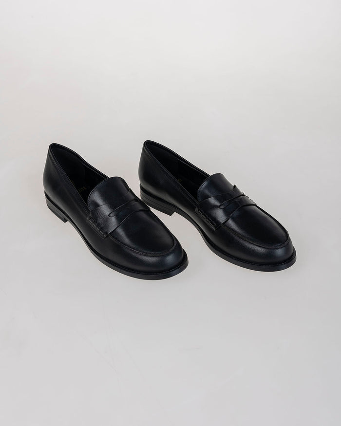 system action Mocasin plano de piel