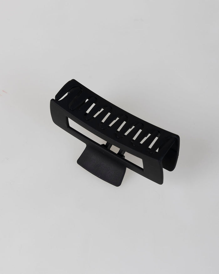 system action Pinza pelo negra