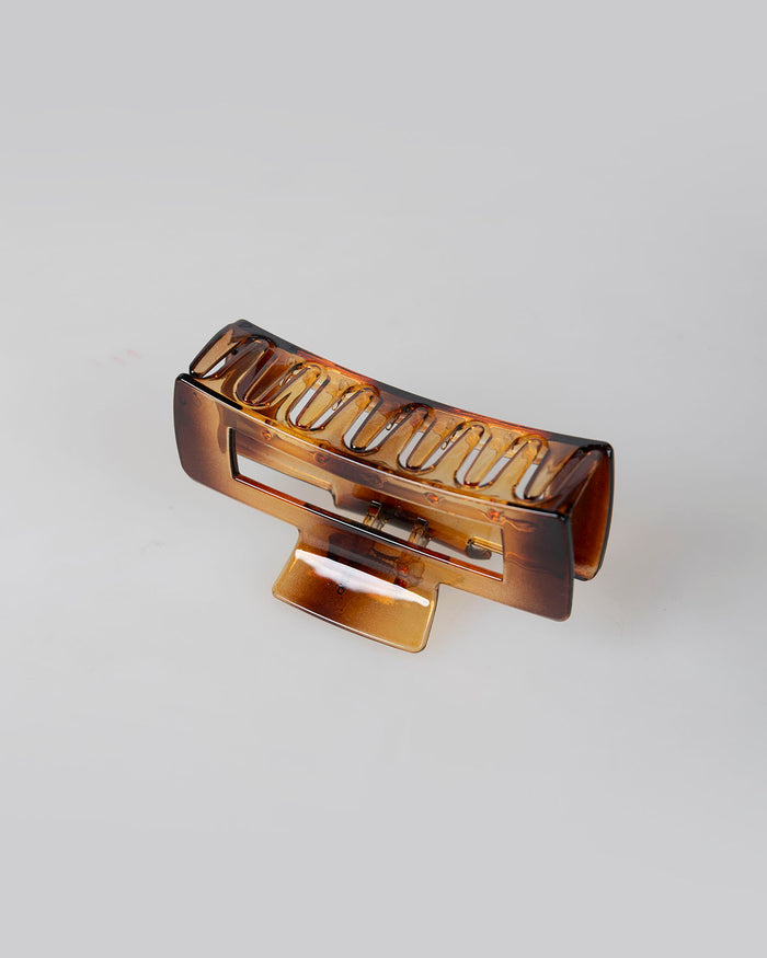 system action Pinza pelo rectangular marrón