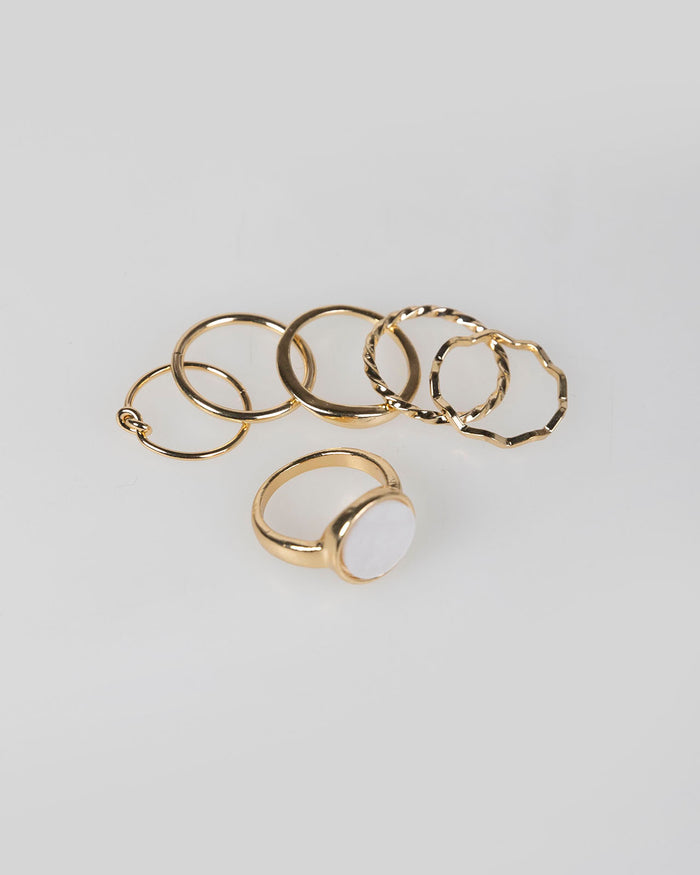 system action Set de seis anillos color oro