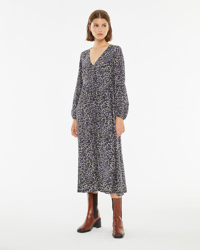 system action Vestido largo estampado con goma en puños