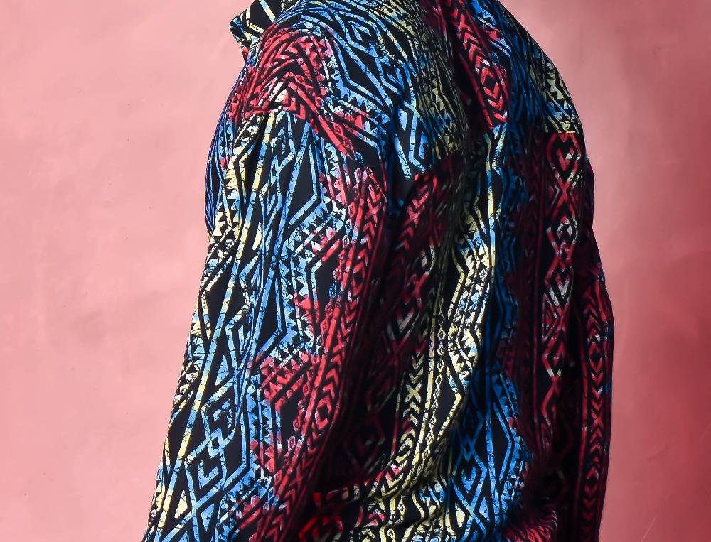 The New Black ca ml tribal print red bue yellow