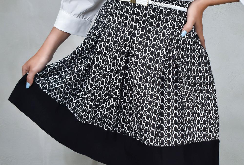 The New Black FALDA PLISADA PRINT BLANCO Y NEGRO