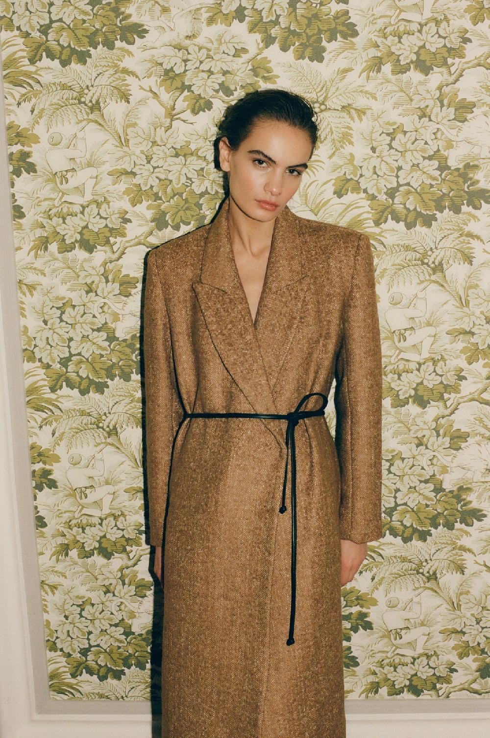 the new society Abrigo de la mujer júpiter