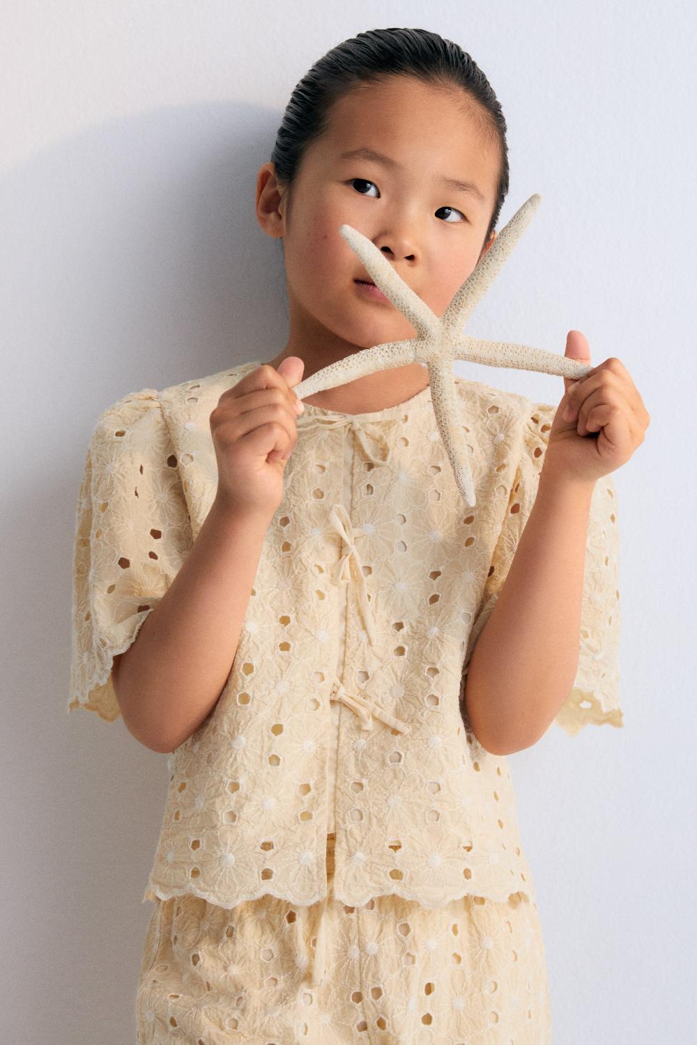 the new society Blusa creta