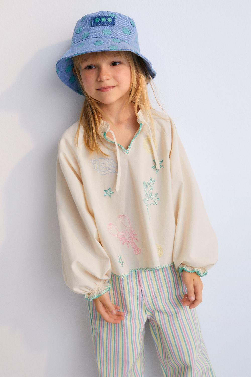 the new society Blusa kostas