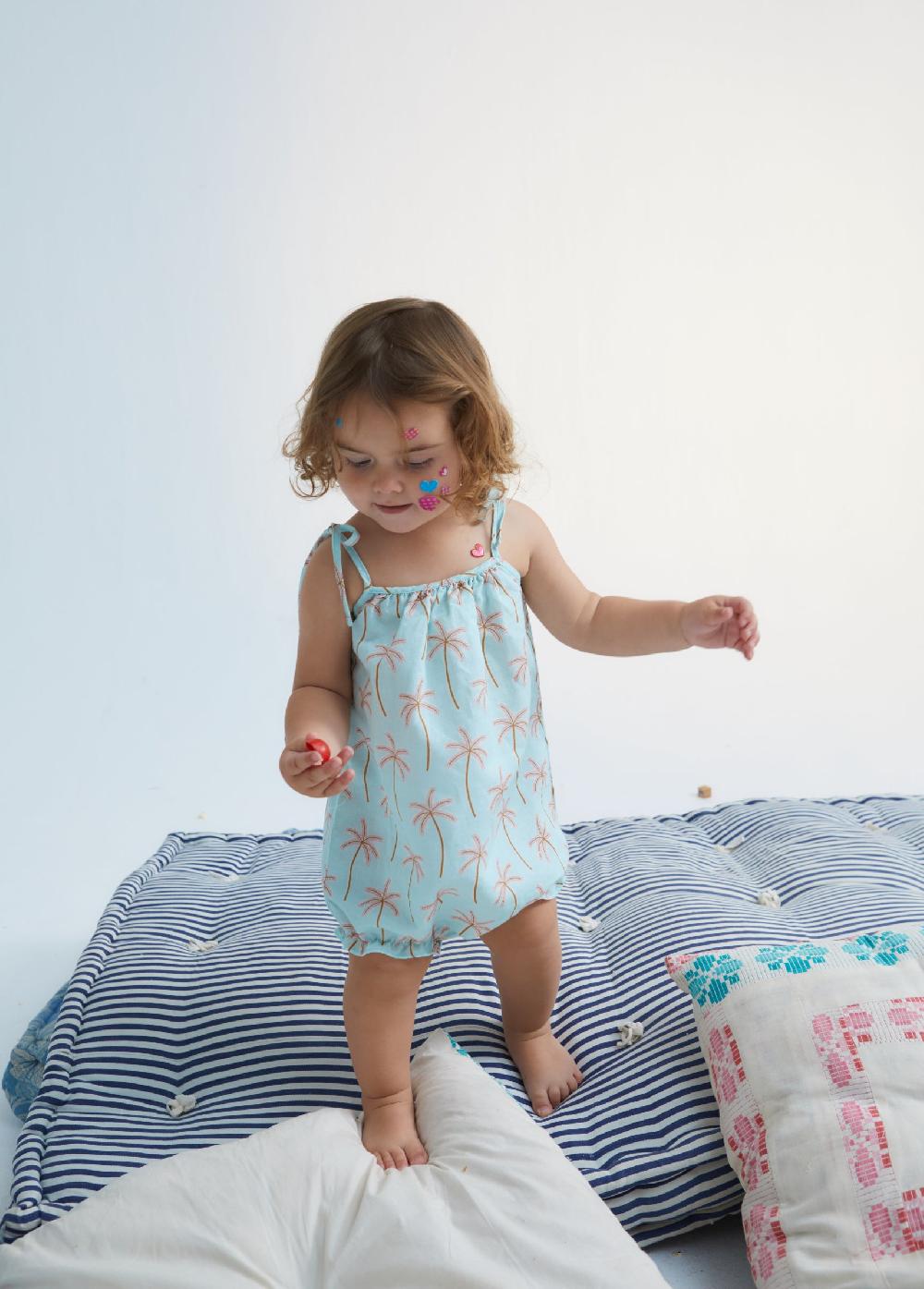 the new society Mamel de palmera para bebés