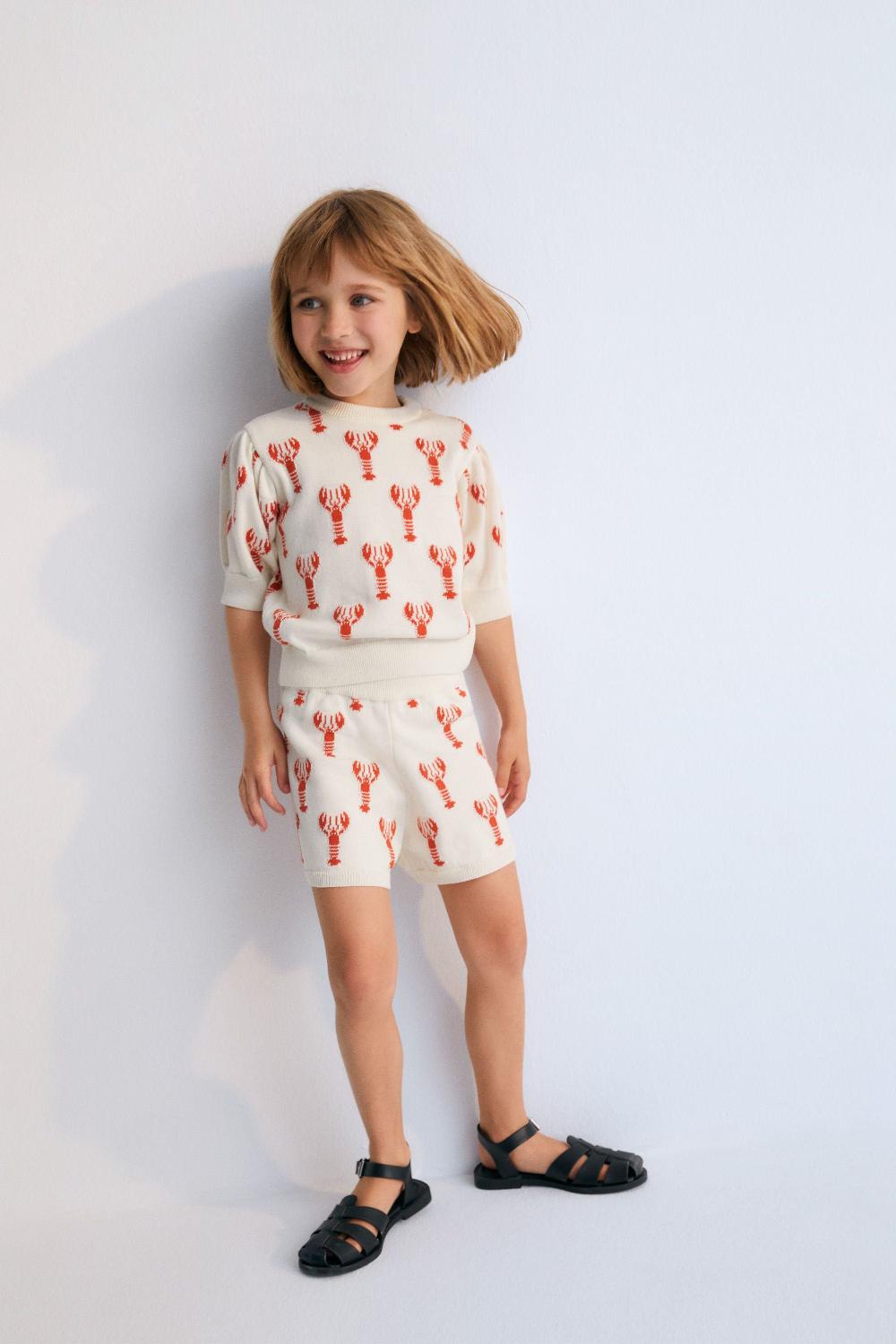 the new society Motivo de langosta corta oia