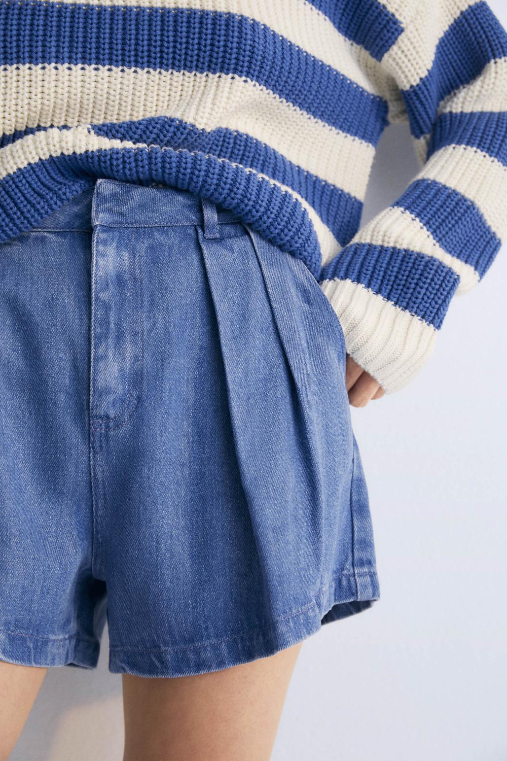 the new society Mujer Micenas corta