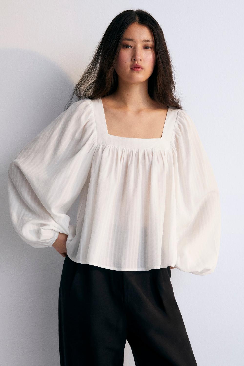 the new society Symi mujer blusa blanca
