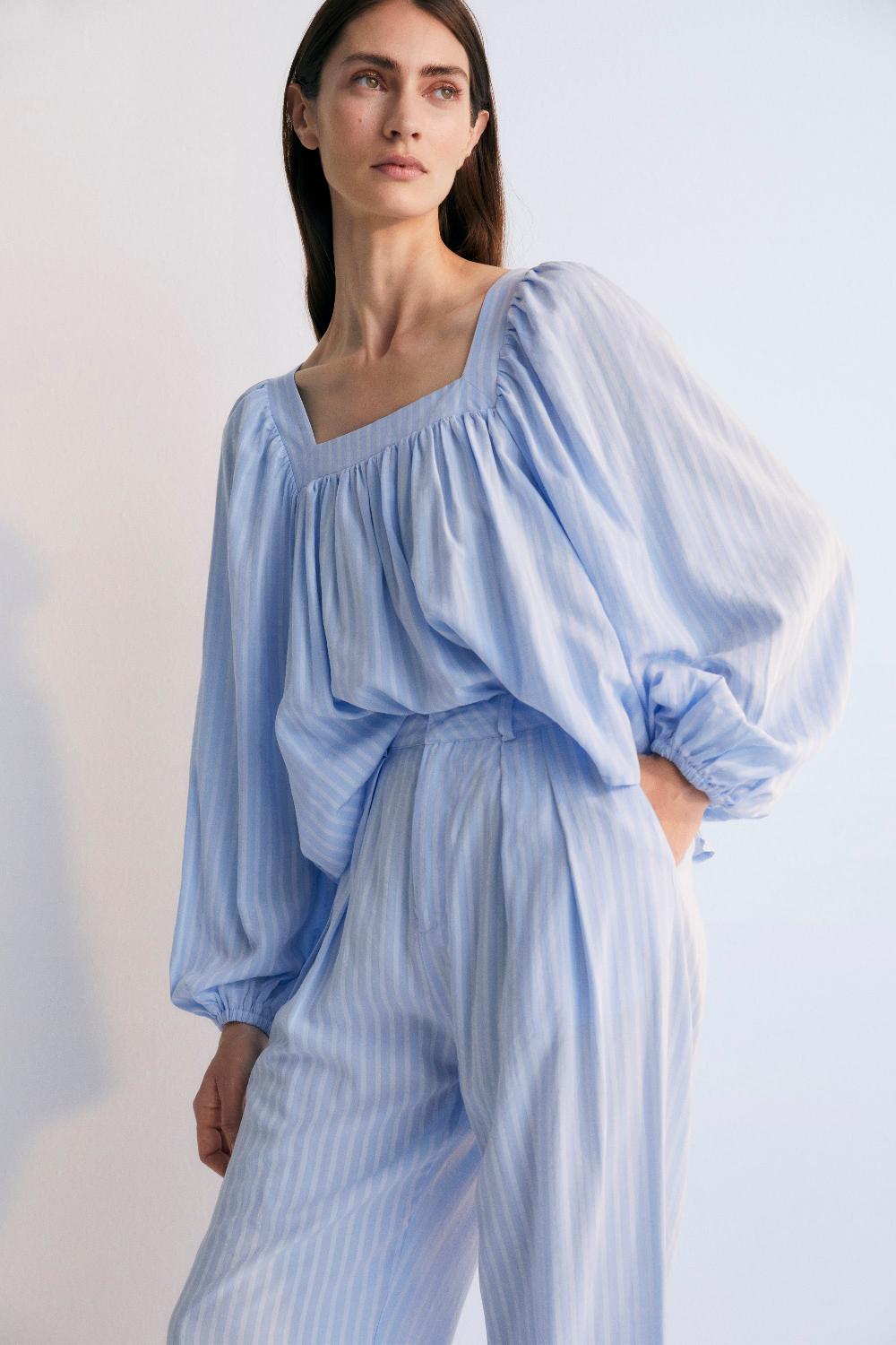 the new society Symi woman blusa polvo azul