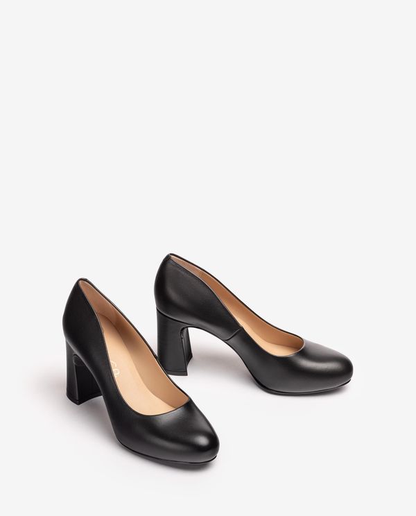 Unisa Salón Con Plataforma Interior