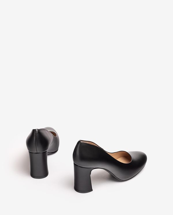 Unisa Salón Con Plataforma Interior