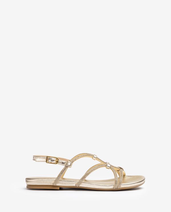 unisa Sandalia plana metalizada