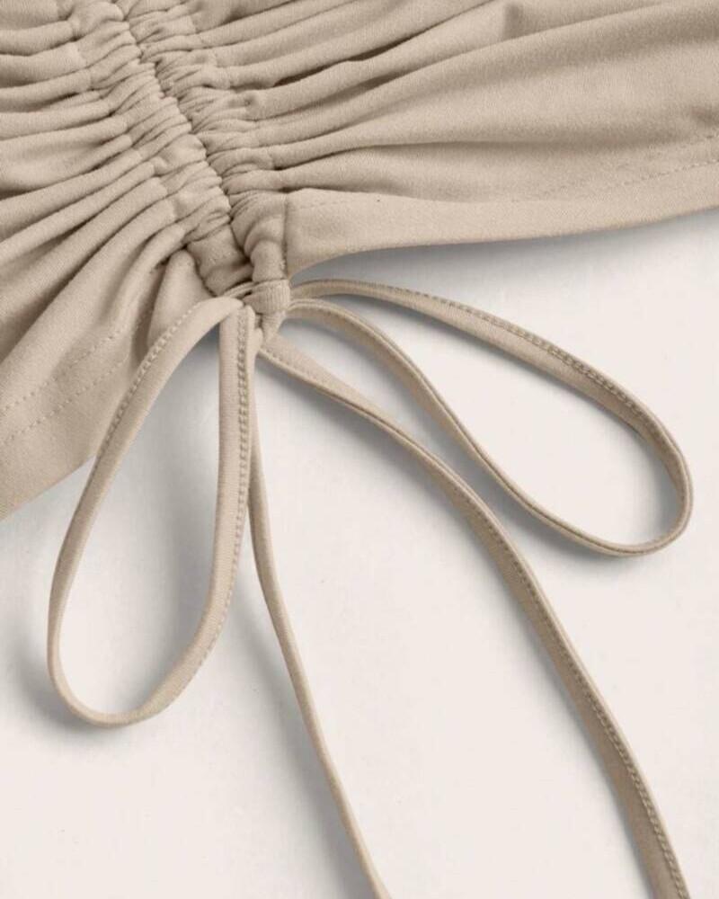 Viceversa CONJUNTO TOP ASIMETRICO Y FALDA BEIGE