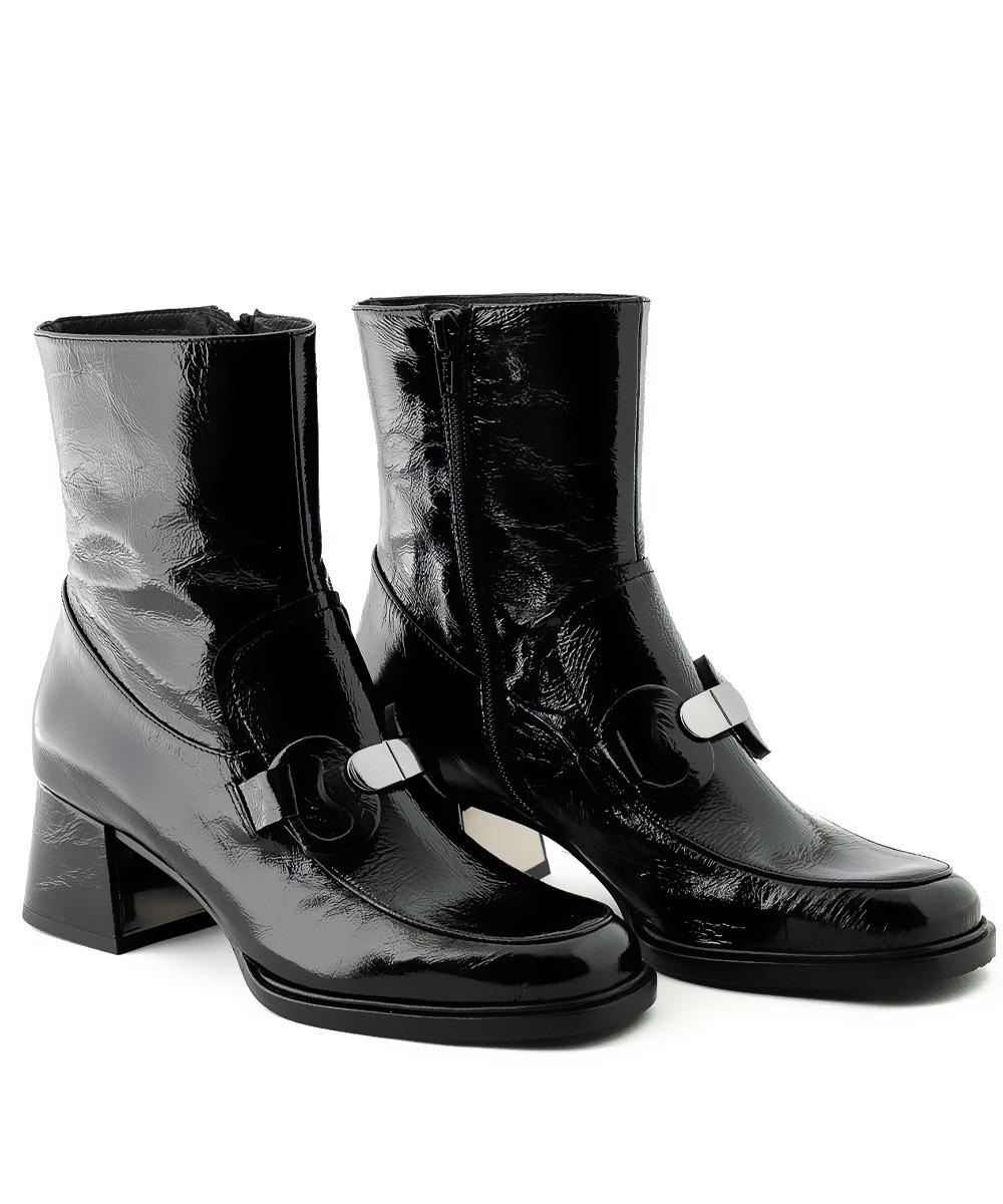 zinda Botín de piel negra con hebilla y cremallera