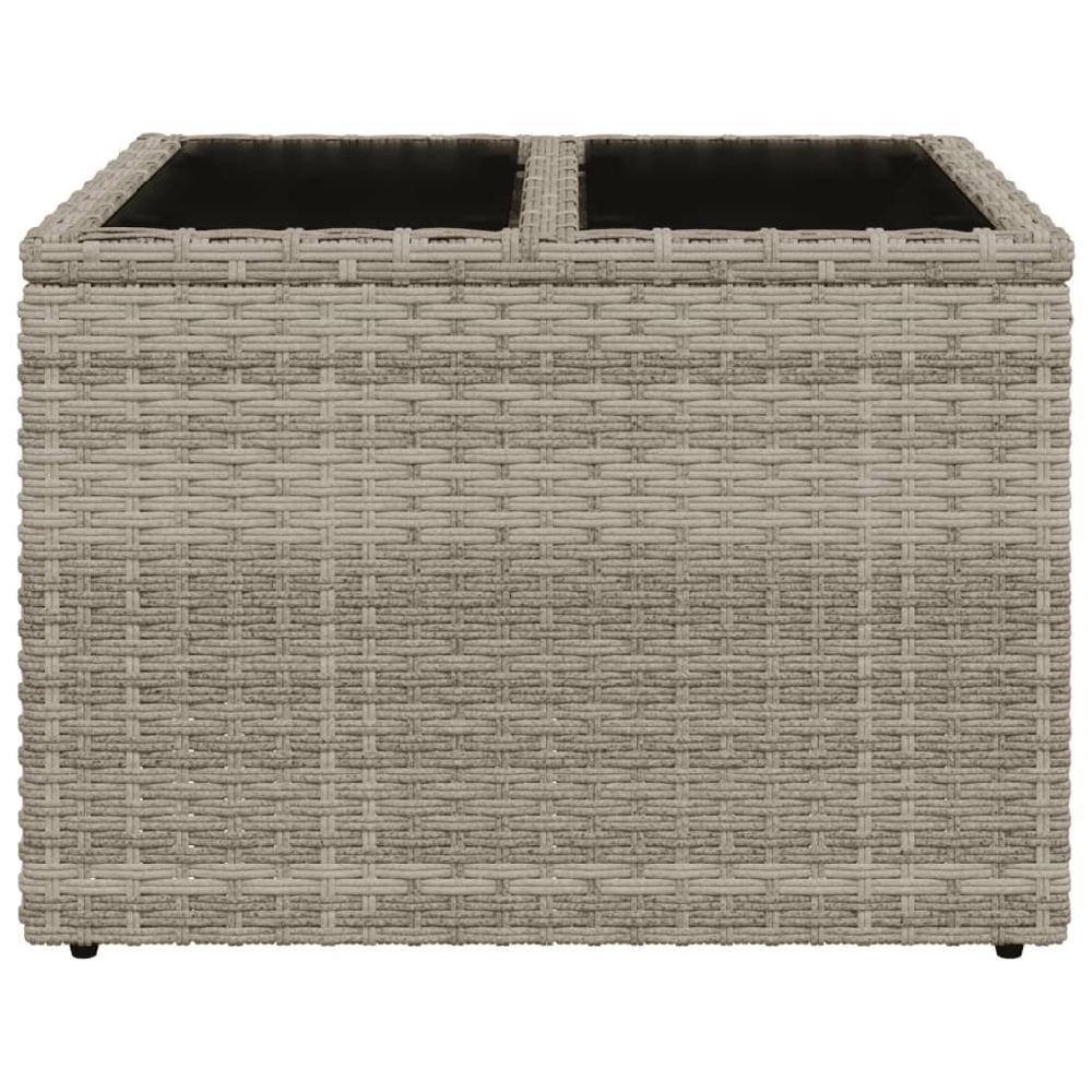 Mesa de jardín con tapa de cristal gris claro en resina trenzada