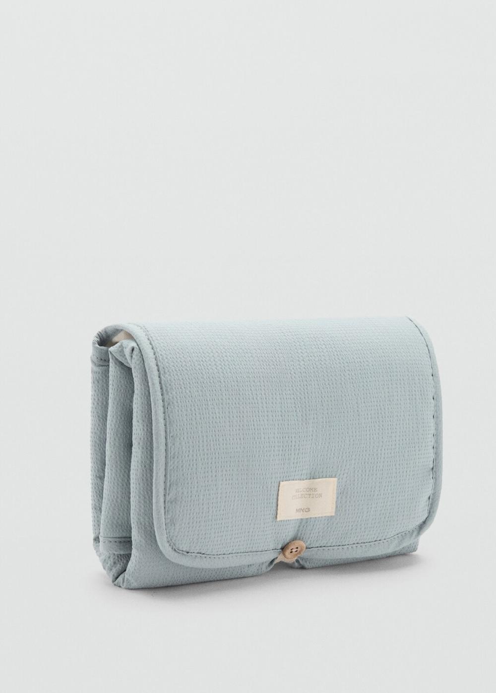 Mango Cambiador de viaje textura