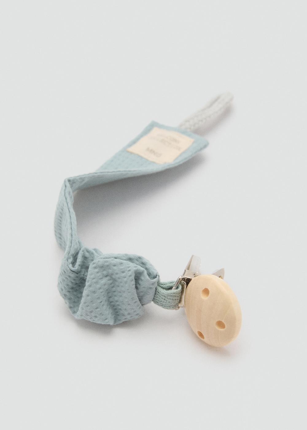 Mango Chupetero broche textura