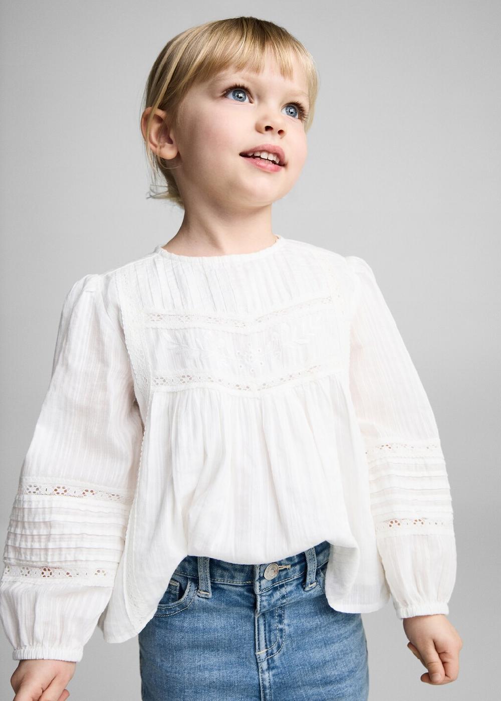 Mango Jeans flare bajo deshilachado