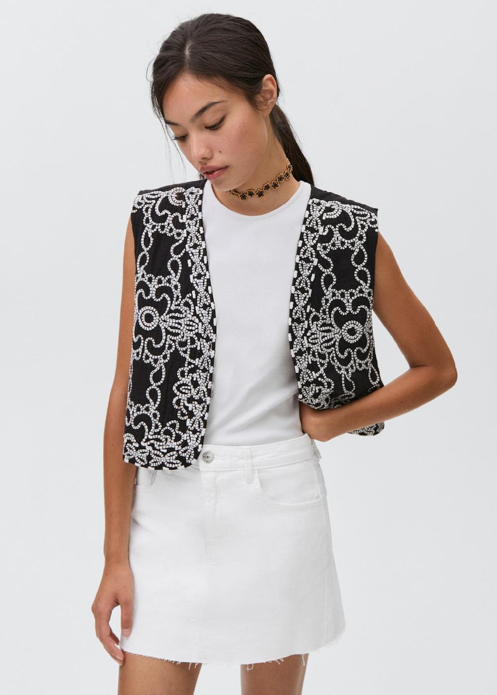 Mango Minifalda vaquera bajo deshilachado