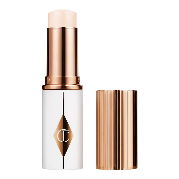 Charlotte Tilbury Unreal Skin Sheer Glow Tint - Stick base de maquillaje hidratante