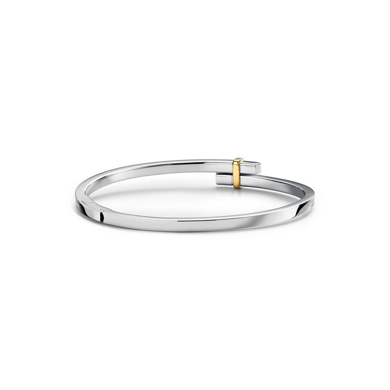 Tiffany & Co. Tiffany Edge Brazalete Hinged Bypass En Platino Y Oro Amarillo Con Diamantes