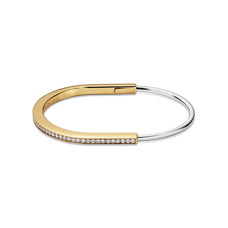 Tiffany & Co. Tiffany Lock Brazalete estrecho de oro amarillo y blanco con medio pavé de diamantes