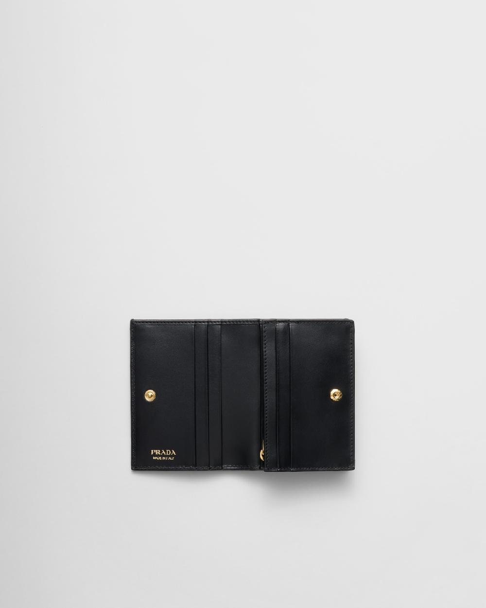 Prada Cartera pequeña de piel con motivo de triángulos