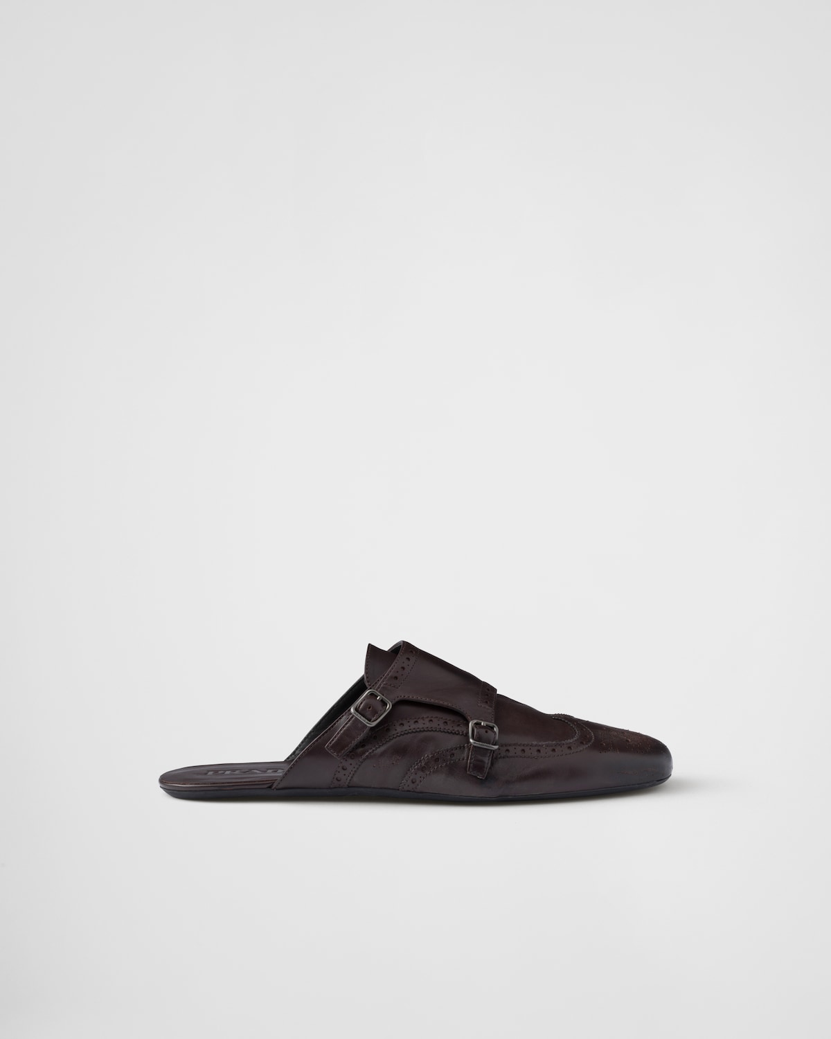 Prada Mules Shuffle de piel con doble tira de hebilla