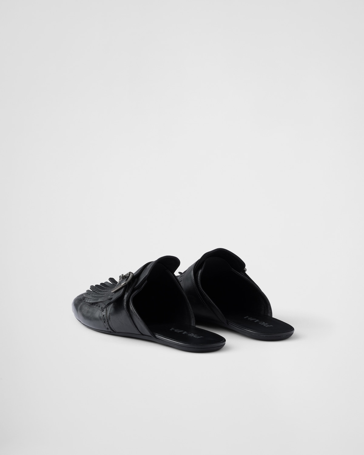 Prada Mules Shuffle De Piel Con Flecos Y Correa De Hebilla