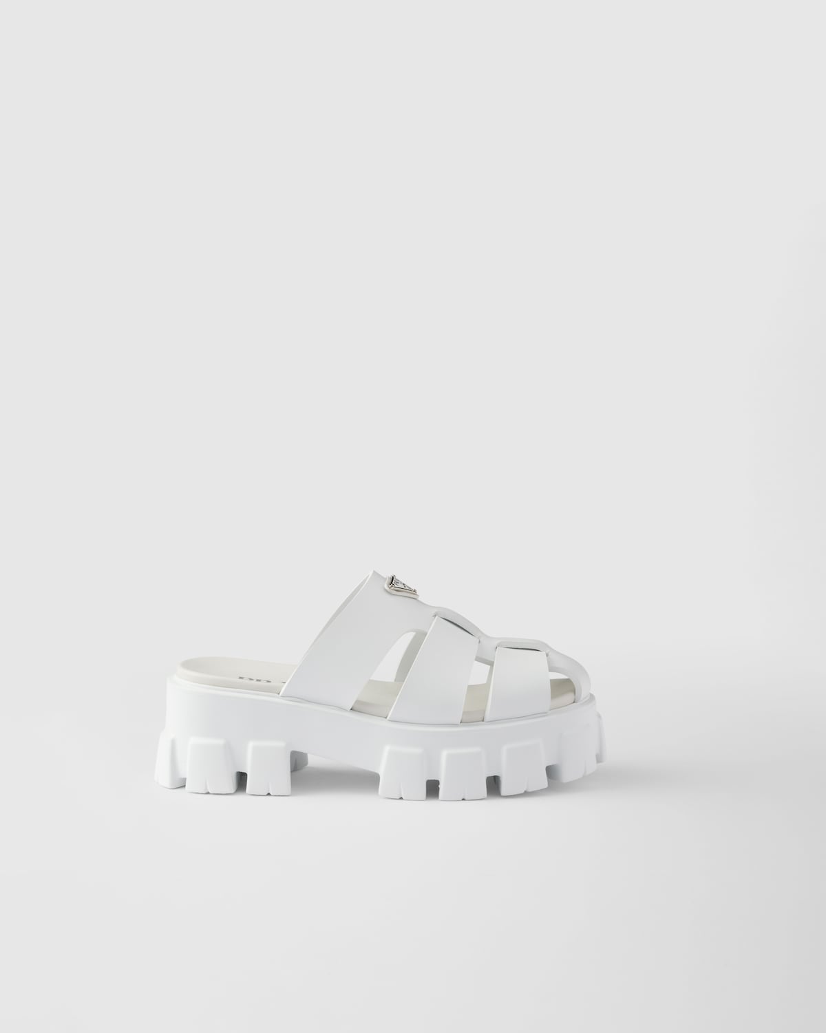 Prada Mules de goma Monolith
