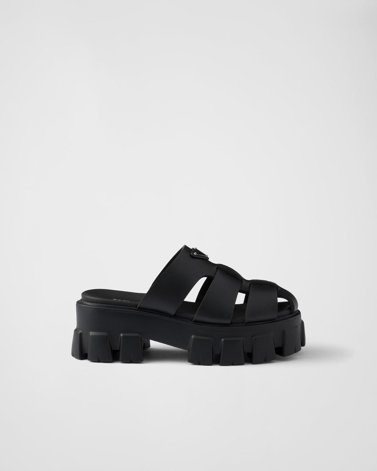 Prada Mules de goma Monolith