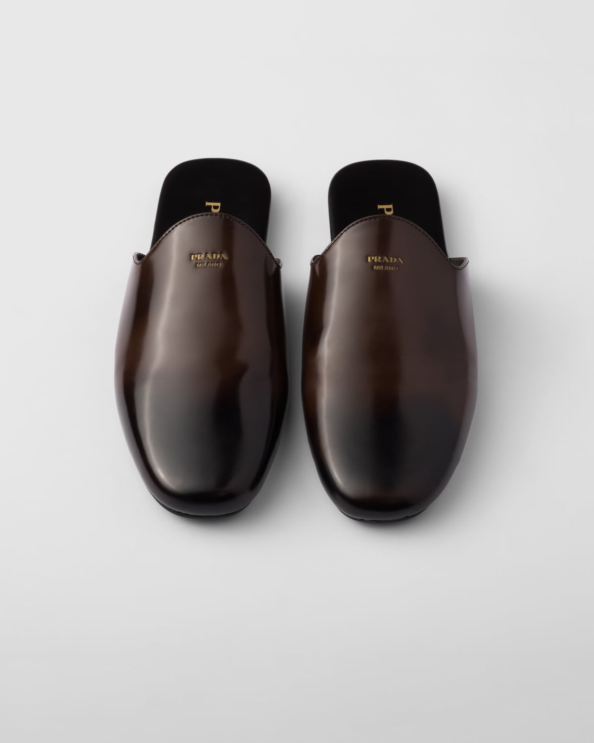 Prada Mules De Piel Cepillada