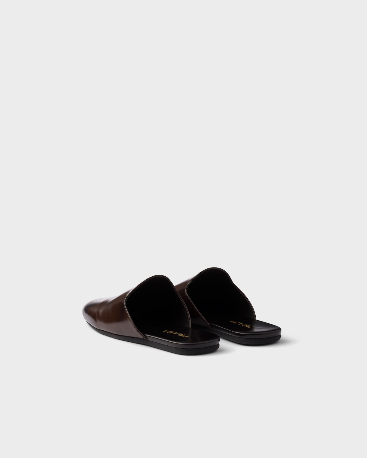 Prada Mules De Piel Cepillada