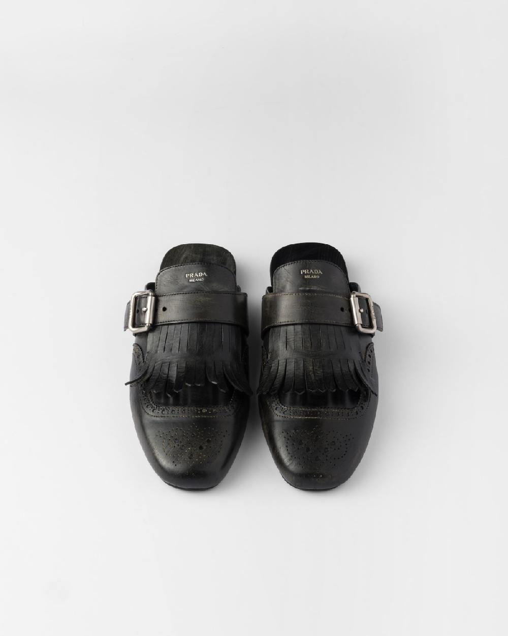 Prada Mules Shuffle De Piel Con Flecos