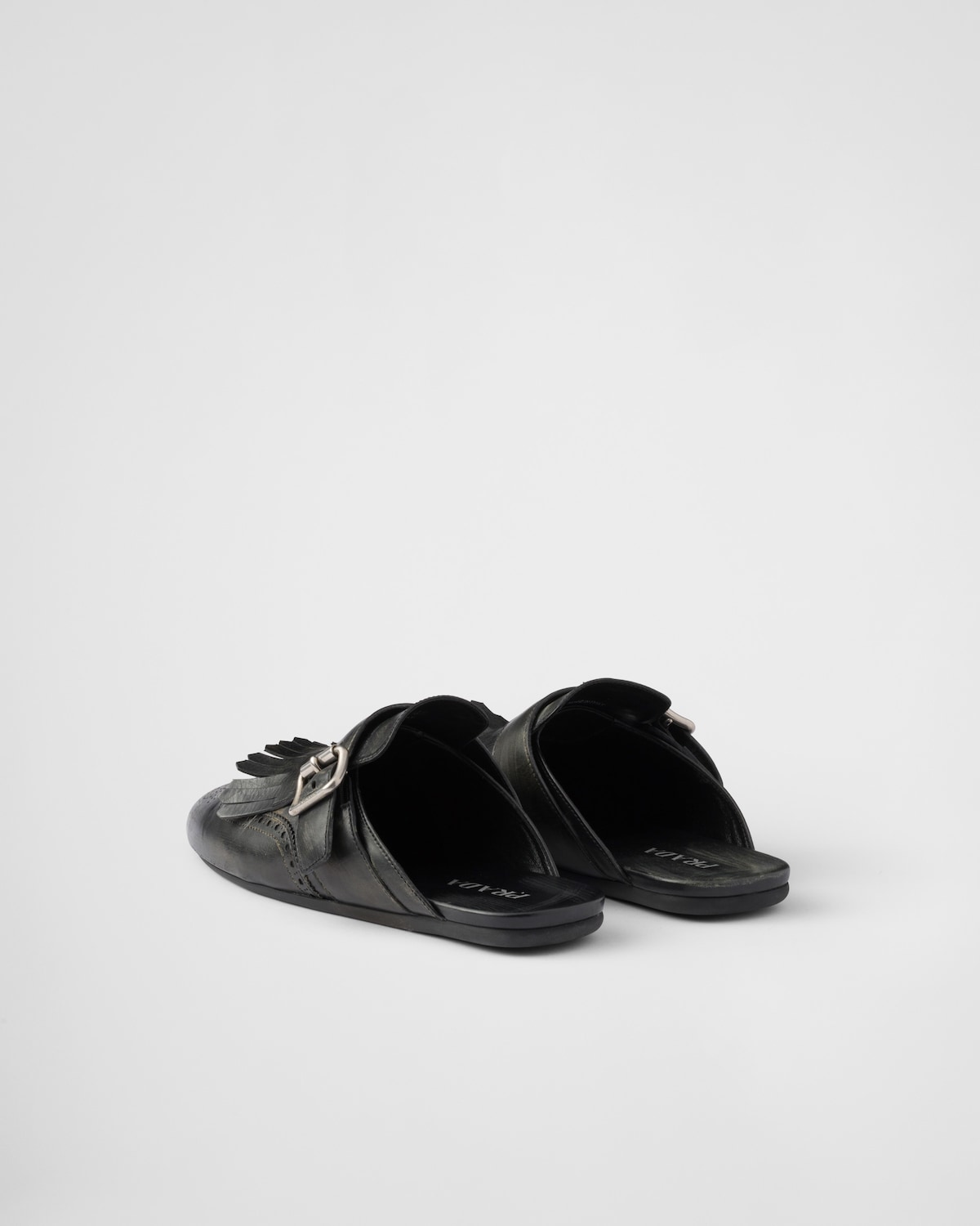 Prada Mules Shuffle De Piel Con Flecos