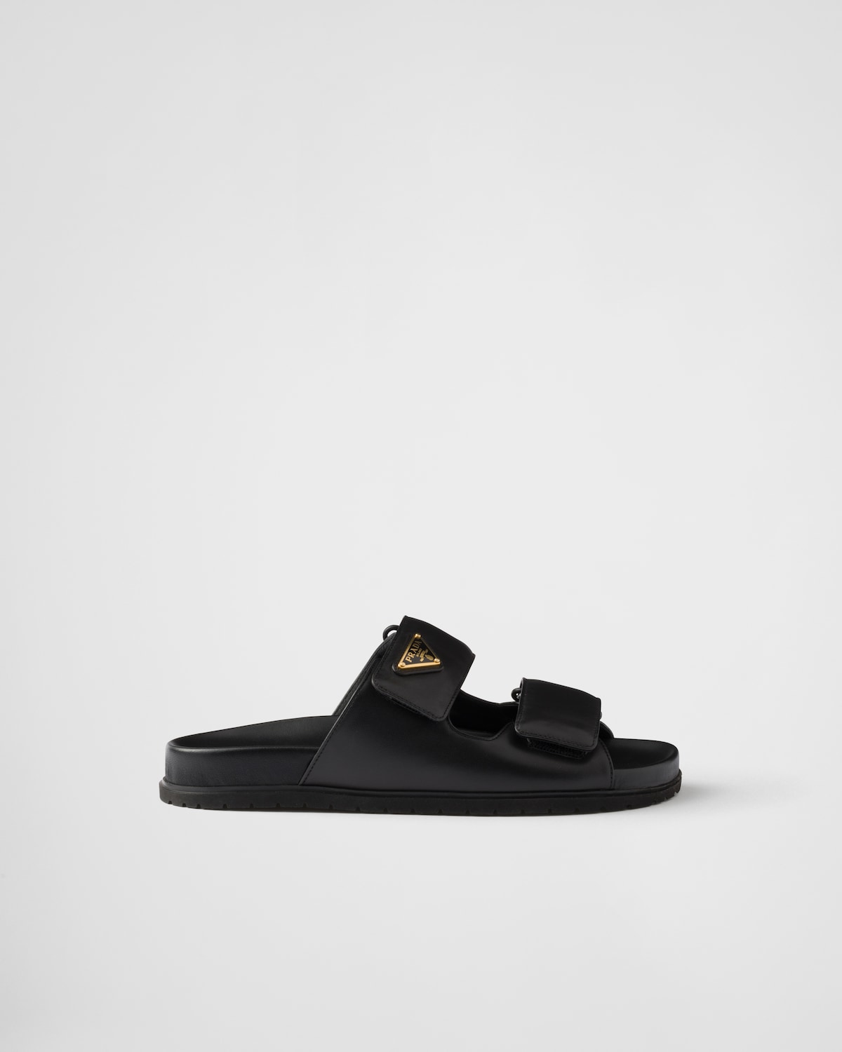 Prada Sandalias planas de piel de napa