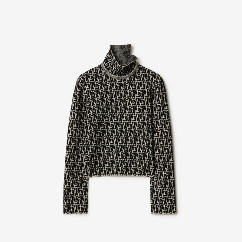 Burberry Jersey en mezcla de lana con motivo B CharmPrecio 1.350 00 €