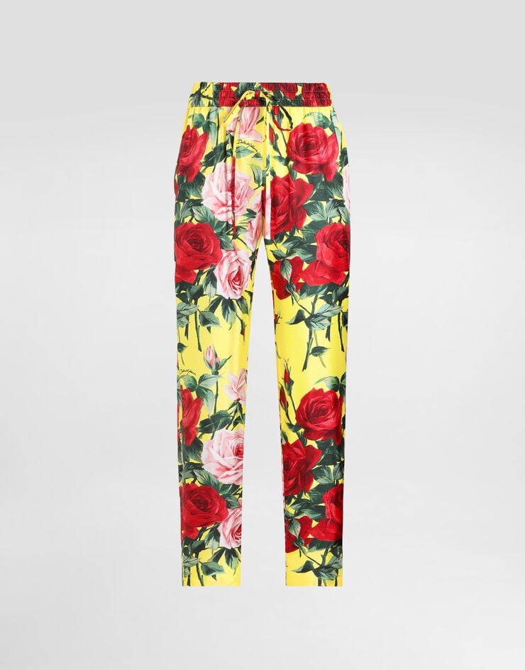 Dolce & Gabbana Pantalones en sarga de seda con estampado Bouquet