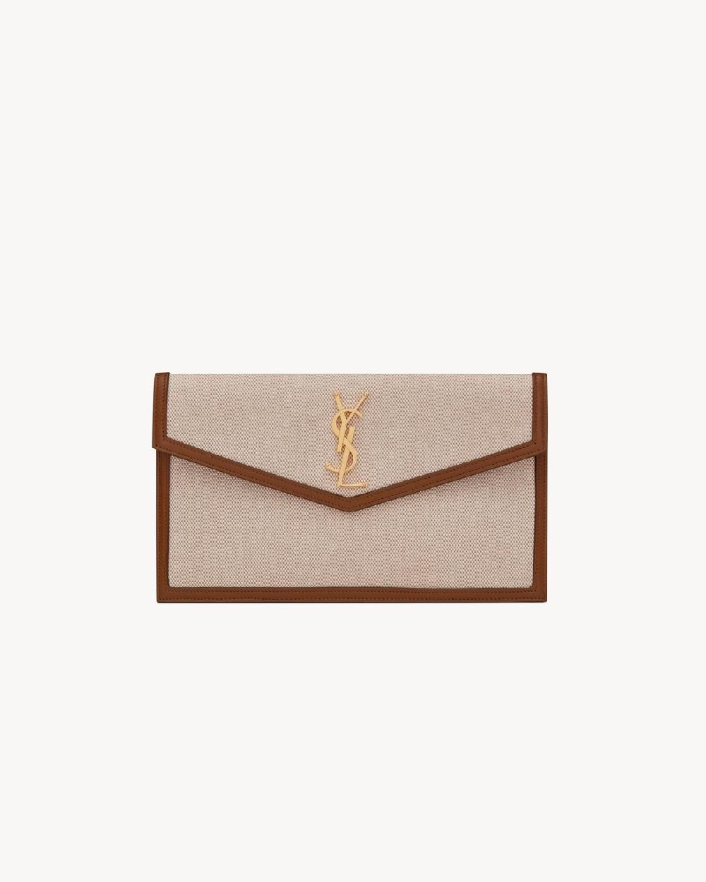 Saint Laurent pochette uptown de lona y piel lisa