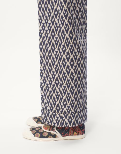 Valentino PANTALÓN DE LANA CON JACQUARD TOUTE LA V EN EL DOBLADILLO