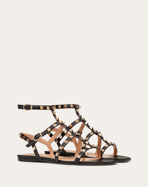 Valentino SANDALIAS PLANAS ROCKSTUD DE PIEL DE BECERRO CON TIRAS