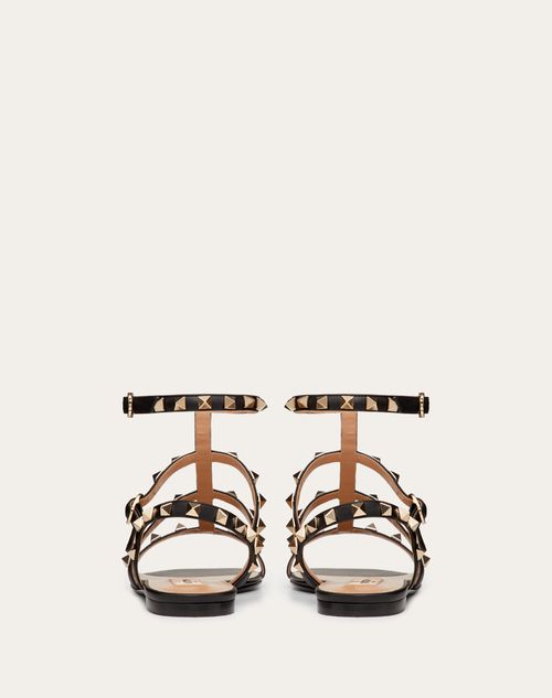 Valentino SANDALIAS PLANAS ROCKSTUD DE PIEL DE BECERRO CON TIRAS