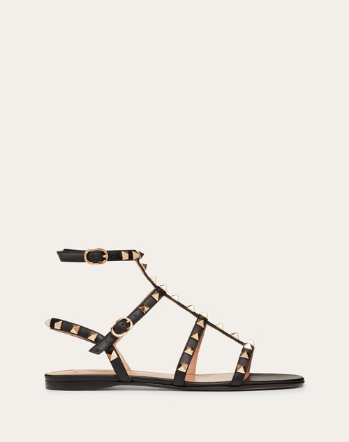 Valentino SANDALIAS PLANAS ROCKSTUD DE PIEL DE BECERRO CON TIRAS