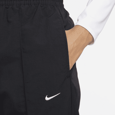 Nike Nike Sportswear Everything WovensPantalón De Talle Medio Con Dobladillo Abierto - Mujer