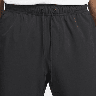 Nike Nike UnlimitedPantalón Versátil Con Bajos Con Cremallera Dri-FIT ADV - Hombre