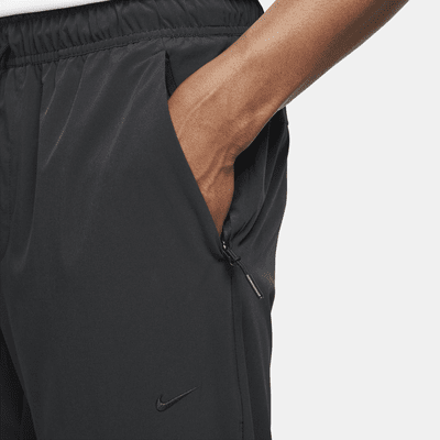 Nike Nike UnlimitedPantalón Versátil Con Bajos Con Cremallera Dri-FIT ADV - Hombre