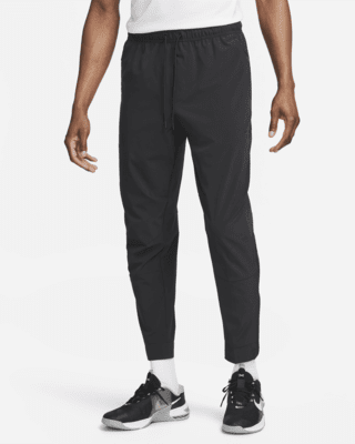Nike Nike UnlimitedPantalón versátil con bajos con cremallera Dri-FIT ADV - Hombre